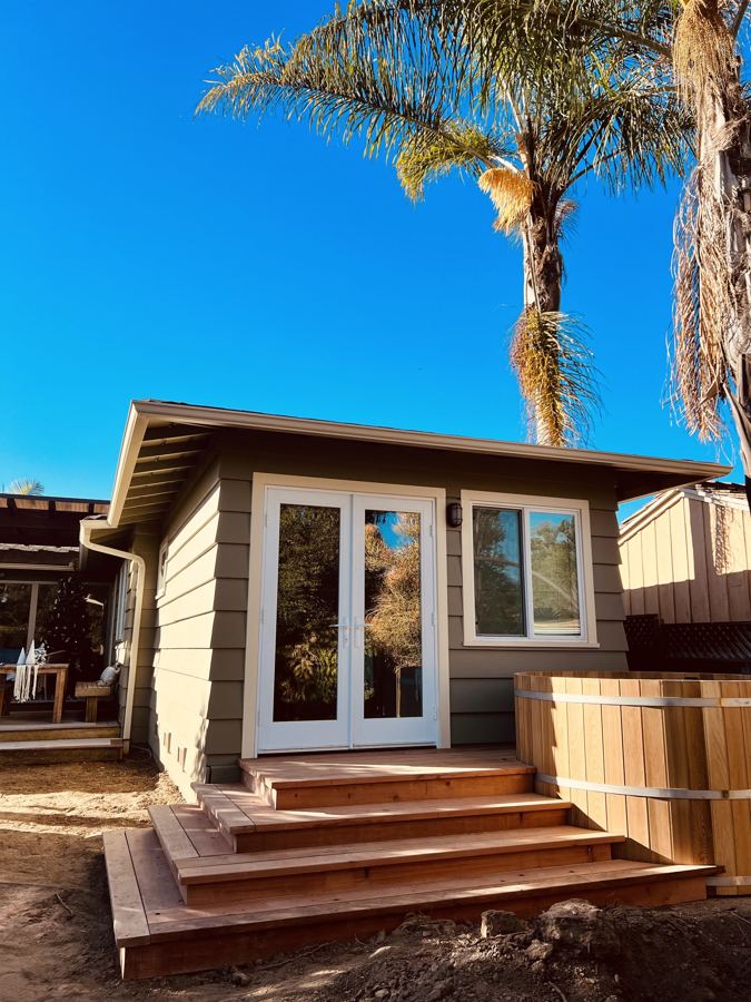 Redwood steps and deck at a backyard studio