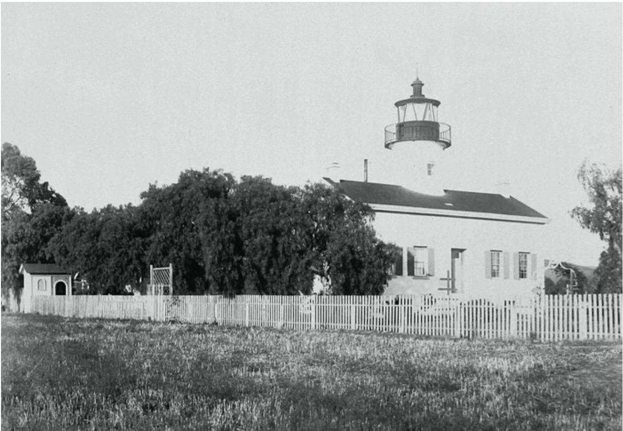 The Santa Barbara lighthouse in 1894, ringed by a white picket fence