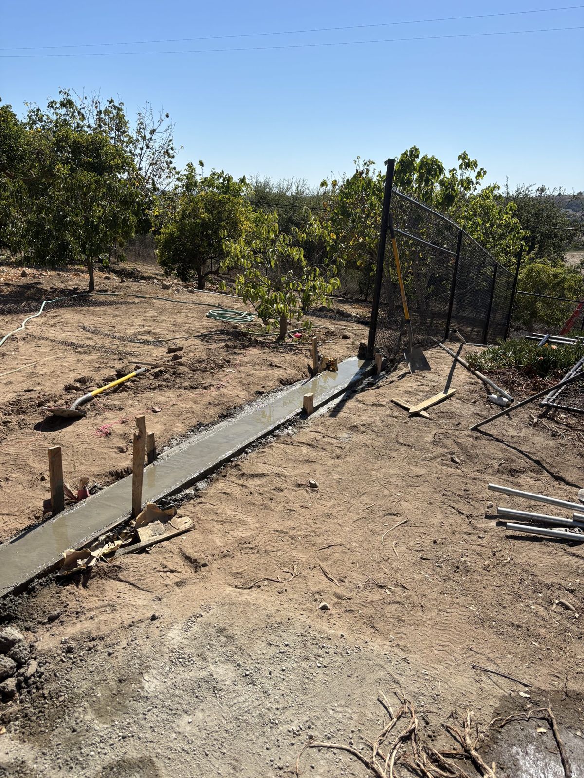 Field fencing along an orchard in the Santa Ynez Valley
