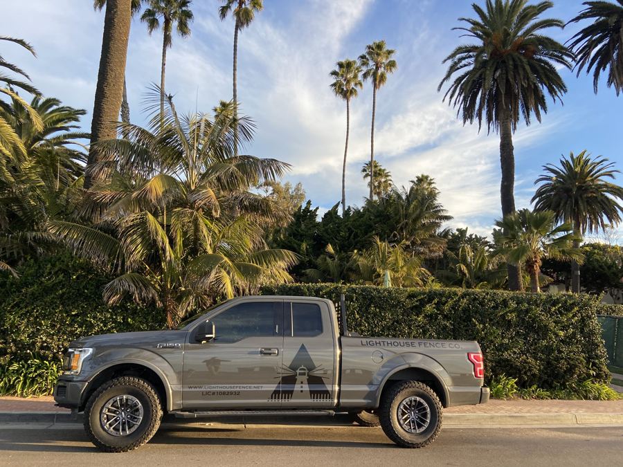 Kevin's Lighthouse Fence truck under Santa Barbara palms