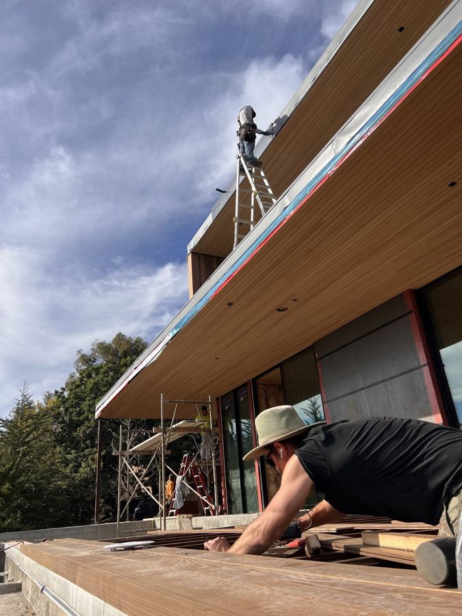 Rooftop deck under construction with ocean view