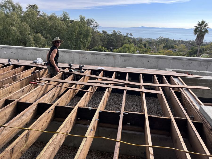 Rooftop hardwood deck build overlooking the Pacific