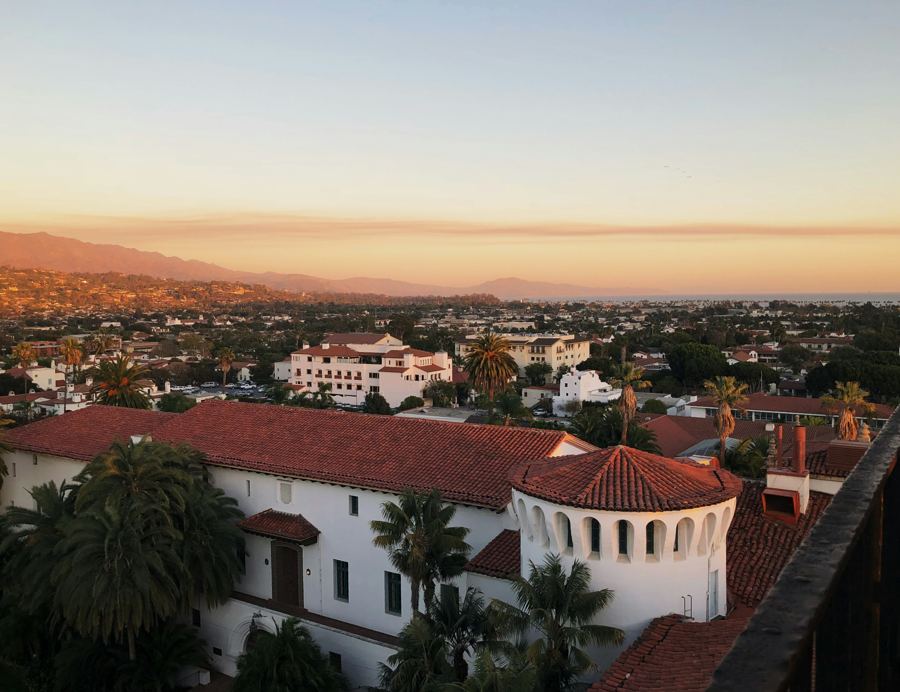 Red-tile rooftops of Santa Barbara at sunset from the courthouse tower