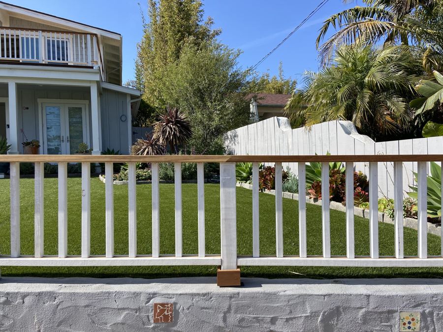 White railing along front wall