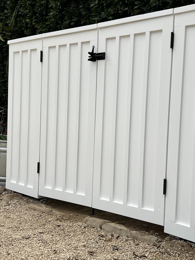 White vertical tongue-and-groove double gate in Santa Barbara